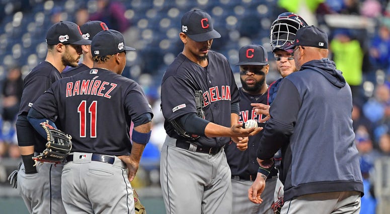 Cleveland Indians starting pitcher Carlos Carrasco (59) gets taken out of the game by Cleveland Indians manager Terry Francona (77)during the first inning against the Kansas City Royals at Kauffman Stadium. Cleveland Indians starting pitcher Carlos Carrasco (59) gets taken out of the game by Cleveland Indians manager Terry Francona (77)during the first inning against the Kansas City Royals at Kauffman Stadium.