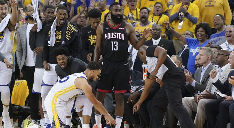 Golden State Warriors guard Stephen Curry (30) and NBA referee Courtney Kirkland (61) point after Houston Rockets guard James Harden (13) stepped out of bounds during the fourth quarter in game one of the second round of the 2019 NBA Playoffs at Oracle Ar Golden State Warriors guard Stephen Curry (30) and NBA referee Courtney Kirkland (61) point after Houston Rockets guard James Harden (13) stepped out of bounds during the fourth quarter in game one of the second round of the 2019 NBA Playoffs at Oracle Ar