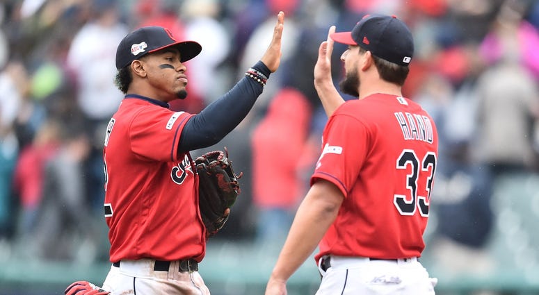 May 4, 2019; Cleveland, OH, USA; Cleveland Indians shortstop Francisco Lindor (12) and relief pitcher Brad Hand (33) celebrate after the Indians beat the Seattle Mariners at Progressive Field. Mandatory Credit: Ken Blaze-USA TODAY Sports May 4, 2019; Cleveland, OH, USA; Cleveland Indians shortstop Francisco Lindor (12) and relief pitcher Brad Hand (33) celebrate after the Indians beat the Seattle Mariners at Progressive Field. Mandatory Credit: Ken Blaze-USA TODAY Sports