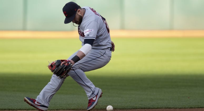 Cleveland Indians second baseman Jason Kipnis (22) fields a ball hit by Oakland Athletics Jurickson Profar during the first inning of a Major League Baseball game at Oakland Coliseum. Cleveland Indians second baseman Jason Kipnis (22) fields a ball hit by Oakland Athletics Jurickson Profar during the first inning of a Major League Baseball game at Oakland Coliseum.