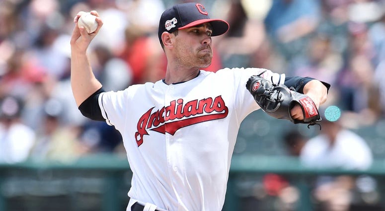 Cleveland Indians starting pitcher Shane Bieber (57) throws a pitch during the first inning against the New York Yankees at Progressive Field. Cleveland Indians starting pitcher Shane Bieber (57) throws a pitch during the first inning against the New York Yankees at Progressive Field.