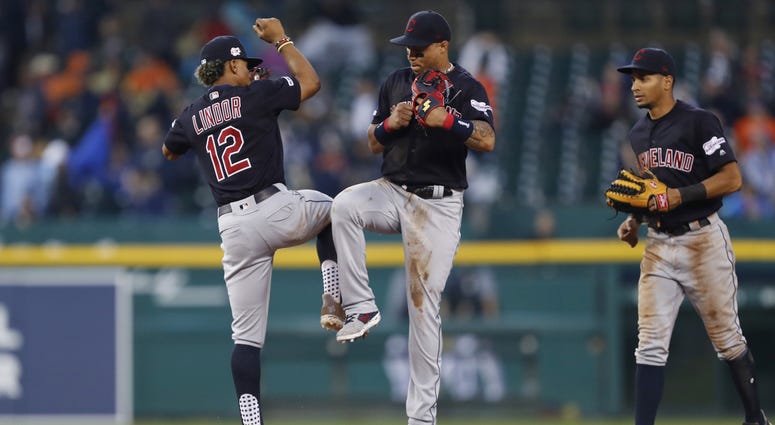 Cleveland Indians center fielder Leonys Martin (2) celebrates with shortstop Francisco Lindor (12) after the game against the Detroit Tigers at Comerica Park. Cleveland Indians center fielder Leonys Martin (2) celebrates with shortstop Francisco Lindor (12) after the game against the Detroit Tigers at Comerica Park.