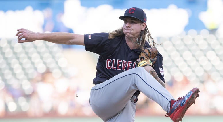 Jun 17, 2019; Arlington, TX, USA; Cleveland Indians starting pitcher Mike Clevinger (52) pitches against the Texas Rangers during the first inning at Globe Life Park in Arlington. Mandatory Credit: Jerome Miron-USA TODAY Sports Jun 17, 2019; Arlington, TX, USA; Cleveland Indians starting pitcher Mike Clevinger (52) pitches against the Texas Rangers during the first inning at Globe Life Park in Arlington. Mandatory Credit: Jerome Miron-USA TODAY Sports