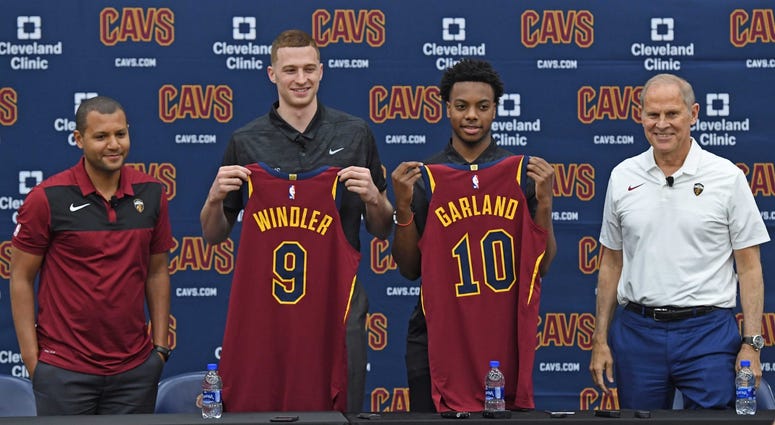 Jun 21, 2019; Independence, OH, USA; Cleveland Cavaliers first round draft picks Dylan Windler and Darius Garland show off their jerseys with General Manager Koby Altman and head coach John Beilein during a press conference at Cleveland Clinic Courts. Jun 21, 2019; Independence, OH, USA; Cleveland Cavaliers first round draft picks Dylan Windler and Darius Garland show off their jerseys with General Manager Koby Altman and head coach John Beilein during a press conference at Cleveland Clinic Courts.