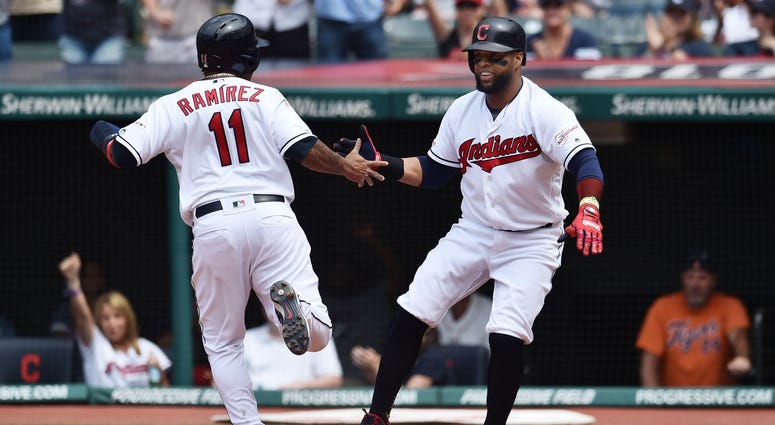 Cleveland Indians third baseman Jose Ramirez (11) and designated hitter Carlos Santana (41) celebrate after scoring during the eighth inning at Progressive Field. Cleveland Indians third baseman Jose Ramirez (11) and designated hitter Carlos Santana (41) celebrate after scoring during the eighth inning at Progressive Field.