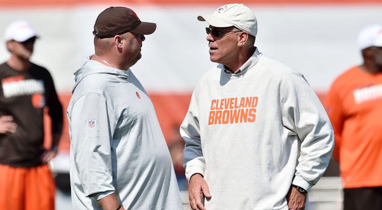 Cleveland Browns head coach Freddie Kitchens (left) talks with general manager John Dorsey during training camp at the Cleveland Browns Training Complex. Cleveland Browns head coach Freddie Kitchens (left) talks with general manager John Dorsey during training camp at the Cleveland Browns Training Complex.