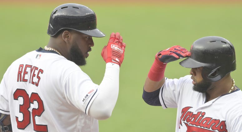 Aug 12, 2019; Cleveland, OH, USA; Cleveland Indians designated hitter Franmil Reyes (32) celebrates his two-run home run with first baseman Carlos Santana (41) in the first inning against the Boston Red Sox at Progressive Field. Mandatory Credit: David Ri Aug 12, 2019; Cleveland, OH, USA; Cleveland Indians designated hitter Franmil Reyes (32) celebrates his two-run home run with first baseman Carlos Santana (41) in the first inning against the Boston Red Sox at Progressive Field. Mandatory Credit: David Ri