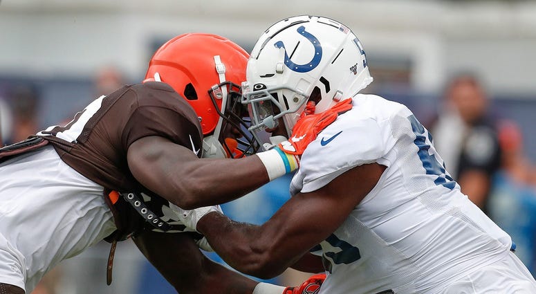 Indianapolis Colts linebacker Skai Moore (55) battles Cleveland Browns running back D'Ernest Johnson (30) during their preseason training camp practice at Grand Park in Westfield on Wednesday, August 14, 2019. Colts Preseason Training Camp Indianapolis Colts linebacker Skai Moore (55) battles Cleveland Browns running back D'Ernest Johnson (30) during their preseason training camp practice at Grand Park in Westfield on Wednesday, August 14, 2019. Colts Preseason Training Camp
