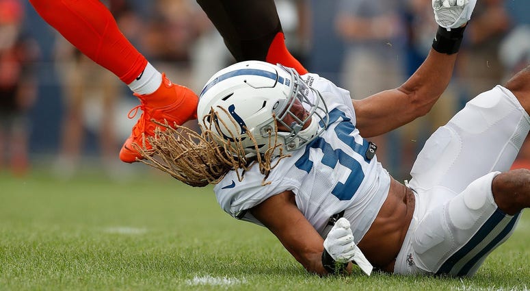 Indianapolis Colts cornerback Jalen Collins (32) gets run over by Cleveland Browns wide receiver Jaelen Strong (10) during their preseason training camp practice at Grand Park in Westfield on Wednesday, August 14, 2019. Colts Preseason Training Camp Indianapolis Colts cornerback Jalen Collins (32) gets run over by Cleveland Browns wide receiver Jaelen Strong (10) during their preseason training camp practice at Grand Park in Westfield on Wednesday, August 14, 2019. Colts Preseason Training Camp