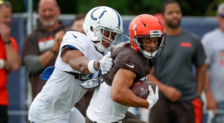 Indianapolis Colts running back D'Onta Foreman (40) grabs Cleveland Browns wide receiver Damon Sheehy-Guiseppi (15) during their preseason training camp practice at Grand Park in Westfield on Wednesday, August 14, 2019. Colts Preseason Training Camp Indianapolis Colts running back D'Onta Foreman (40) grabs Cleveland Browns wide receiver Damon Sheehy-Guiseppi (15) during their preseason training camp practice at Grand Park in Westfield on Wednesday, August 14, 2019. Colts Preseason Training Camp