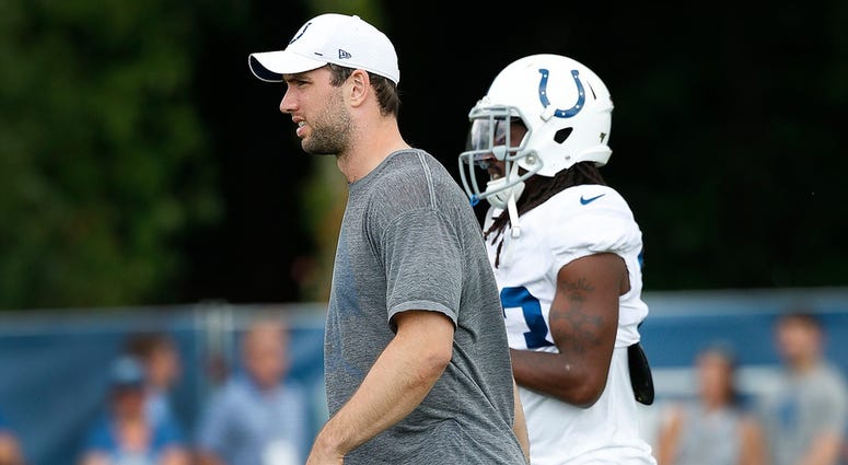 Indianapolis Colts quarterback Andrew Luck (12) with his left ankle tapped during their preseason training camp practice at Grand Park in Westfield on Wednesday, August 14, 2019. Colts Preseason Training Camp Indianapolis Colts quarterback Andrew Luck (12) with his left ankle tapped during their preseason training camp practice at Grand Park in Westfield on Wednesday, August 14, 2019. Colts Preseason Training Camp
