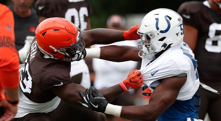 Indianapolis Colts inside linebacker Bobby Okereke (58) battles Cleveland Browns running back Trayone Gray (43) during their preseason training camp practice at Grand Park in Westfield on Wednesday, August 14, 2019. Colts Preseason Training Camp Indianapolis Colts inside linebacker Bobby Okereke (58) battles Cleveland Browns running back Trayone Gray (43) during their preseason training camp practice at Grand Park in Westfield on Wednesday, August 14, 2019. Colts Preseason Training Camp