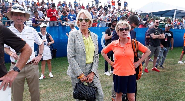 U.S. Secretary of Education Betsy DeVos, middle, watches the Indianapolis Colts and Cleveland Browns preseason training camp practice at Grand Park in Westfield on Wednesday, August 14, 2019. Colts Preseason Training Camp U.S. Secretary of Education Betsy DeVos, middle, watches the Indianapolis Colts and Cleveland Browns preseason training camp practice at Grand Park in Westfield on Wednesday, August 14, 2019. Colts Preseason Training Camp