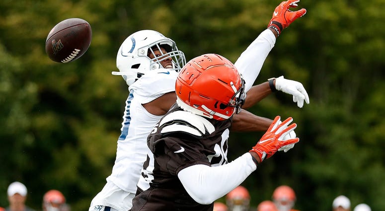 Indianapolis Colts defensive back George Odum (30) knocks the ball away from Cleveland Browns tight end Demetrius Harris (88) during their preseason training camp practice at Grand Park in Westfield on Wednesday, August 14, 2019. Colts Preseason Training Indianapolis Colts defensive back George Odum (30) knocks the ball away from Cleveland Browns tight end Demetrius Harris (88) during their preseason training camp practice at Grand Park in Westfield on Wednesday, August 14, 2019. Colts Preseason Training