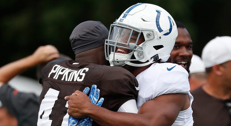 Indianapolis Colts middle linebacker Anthony Walker (50) greets Cleveland Browns cornerback Lenzy Pipkins (41) during their preseason training camp practice at Grand Park in Westfield on Wednesday, August 14, 2019. Colts Preseason Training Camp Indianapolis Colts middle linebacker Anthony Walker (50) greets Cleveland Browns cornerback Lenzy Pipkins (41) during their preseason training camp practice at Grand Park in Westfield on Wednesday, August 14, 2019. Colts Preseason Training Camp