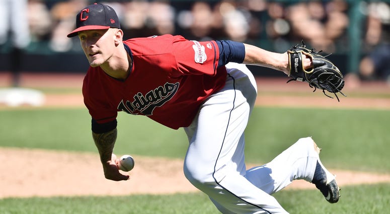 Sep 5, 2019; Cleveland, OH, USA; Cleveland Indians starting pitcher Zach Plesac (65) loses the ball as he tries to field a bunt hit by Chicago White Sox third baseman Danny Mendick (not pictured) during the sixth inning at Progressive Field. Mandatory Cre Sep 5, 2019; Cleveland, OH, USA; Cleveland Indians starting pitcher Zach Plesac (65) loses the ball as he tries to field a bunt hit by Chicago White Sox third baseman Danny Mendick (not pictured) during the sixth inning at Progressive Field. Mandatory Cre