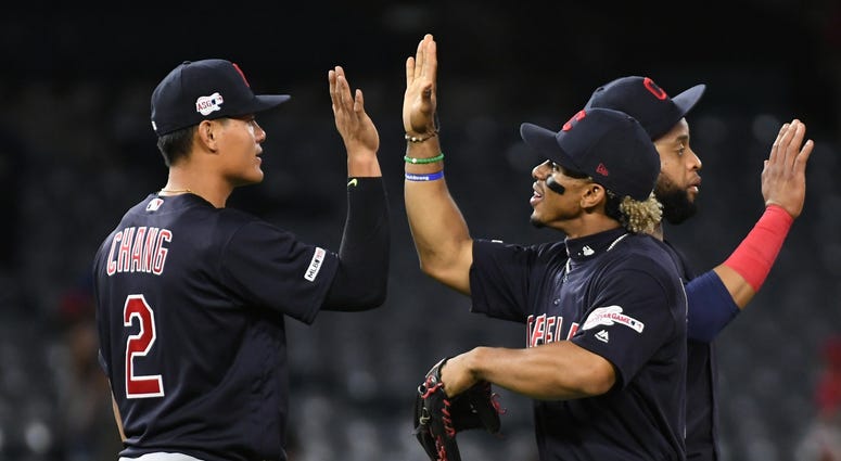 Sep 9, 2019; Anaheim, CA, USA; Cleveland Indians shortstop Francisco Lindor (12) and shortstop Yu Chang (2) celebrate after defeating the Los Angeles Angels at Angel Stadium of Anaheim. Mandatory Credit: Richard Mackson-USA TODAY Sports Sep 9, 2019; Anaheim, CA, USA; Cleveland Indians shortstop Francisco Lindor (12) and shortstop Yu Chang (2) celebrate after defeating the Los Angeles Angels at Angel Stadium of Anaheim. Mandatory Credit: Richard Mackson-USA TODAY Sports