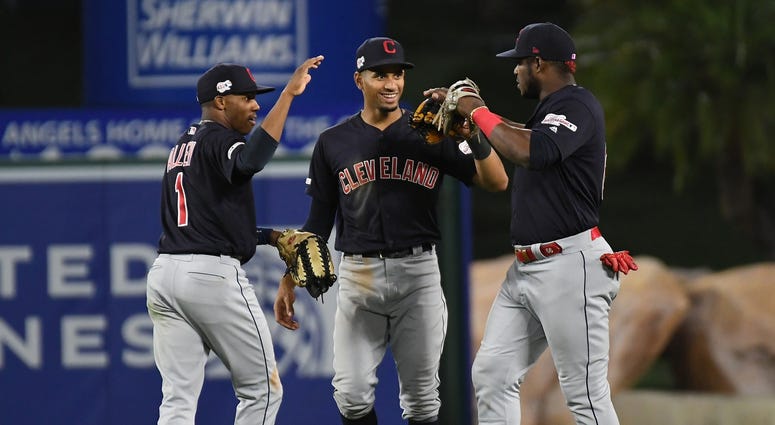 Sep 9, 2019; Anaheim, CA, USA; Cleveland Indians left fielder Greg Allen (1) and center fielder Oscar Mercado (35) and right fielder Yasiel Puig (66) celebrate after defeating the Los Angeles Angels at Angel Stadium of Anaheim. Mandatory Credit: Richard M Sep 9, 2019; Anaheim, CA, USA; Cleveland Indians left fielder Greg Allen (1) and center fielder Oscar Mercado (35) and right fielder Yasiel Puig (66) celebrate after defeating the Los Angeles Angels at Angel Stadium of Anaheim. Mandatory Credit: Richard M