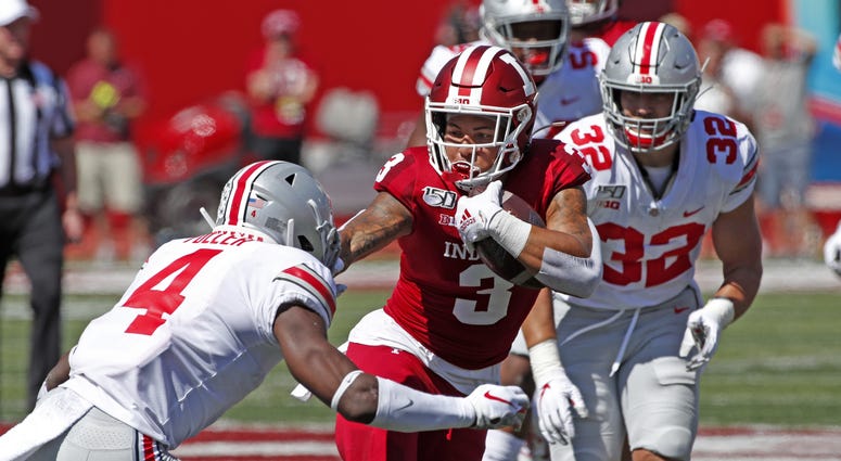 Sep 14, 2019; Bloomington, IN, USA; Indiana Hoosiers wide receiver Ty Fryfogle (3) runs with the ball against Ohio State Buckeyes safety Jordan Fuller (4) during the third quarter at Memorial Stadium . Indiana Hoosiers wide receiver Ty Fryfogle (3) runs with the ball against Ohio State Buckeyes safety Jordan Fuller (4) during the third quarter at Memorial Stadium