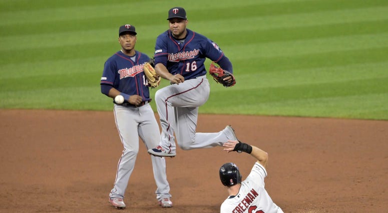 Sep 14, 2019; Cleveland, OH, USA; Minnesota Twins second baseman Jonathan Schoop (16) turns a double play beside shortstop Jorge Polanco (11) and Cleveland Indians second baseman Mike Freeman (6) in the second inning at Progressive Field. Mandatory Credit Sep 14, 2019; Cleveland, OH, USA; Minnesota Twins second baseman Jonathan Schoop (16) turns a double play beside shortstop Jorge Polanco (11) and Cleveland Indians second baseman Mike Freeman (6) in the second inning at Progressive Field. Mandatory Credit