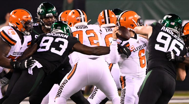 Sep 16, 2019; East Rutherford, NJ, USA; New York Jets linebacker Tarell Basham (93) gets to Cleveland Browns quarterback Baker Mayfield (6) in the first half at MetLife Stadium. New York Jets linebacker Tarell Basham (93) gets to Cleveland Browns quarterback Baker Mayfield (6) in the first half at MetLife Stadium