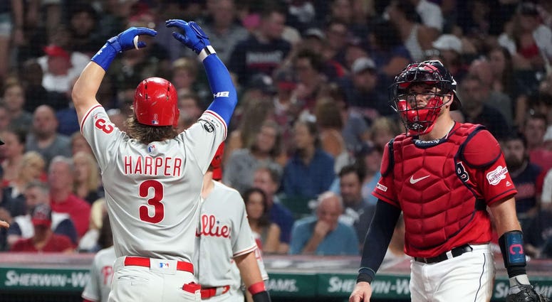 Sep 21, 2019; Cleveland, OH, USA; Philadelphia Phillies right fielder Bryce Harper (3) celebrates after hitting a three-run home run in the fifth inning as Cleveland Indians catcher Kevin Plawecki (right) looks on at Progressive Field. Mandatory Credit: K Sep 21, 2019; Cleveland, OH, USA; Philadelphia Phillies right fielder Bryce Harper (3) celebrates after hitting a three-run home run in the fifth inning as Cleveland Indians catcher Kevin Plawecki (right) looks on at Progressive Field. Mandatory Credit: K