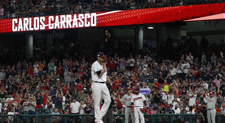 Sep 22, 2019; Cleveland, OH, USA; Cleveland Indians fans react as Cleveland Indians starting pitcher Carlos Carrasco (59) enters the game to pitch against the Philadelphia Phillies during the fourth inning at Progressive Field. Mandatory Credit: Charles L Sep 22, 2019; Cleveland, OH, USA; Cleveland Indians fans react as Cleveland Indians starting pitcher Carlos Carrasco (59) enters the game to pitch against the Philadelphia Phillies during the fourth inning at Progressive Field. Mandatory Credit: Charles L