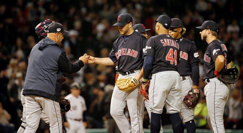 Cleveland Indians starting pitcher Aaron Civale (67) gives the ball to manager Terry Francona (77) as he is taken out of the game after giving up back to back home runs to the Chicago White Sox during the fourth inning at Guaranteed Rate Field. Cleveland Indians starting pitcher Aaron Civale (67) gives the ball to manager Terry Francona (77) as he is taken out of the game after giving up back to back home runs to the Chicago White Sox during the fourth inning at Guaranteed Rate Field.