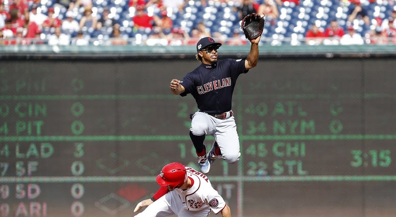 Sep 29, 2019; Washington, DC, USA; Washington Nationals shortstop Trea Turner (7) steals second base as Cleveland Indians shortstop Francisco Lindor (12) leaps to catch the throw from home plate in the first inning at Nationals Park. Mandatory Credit: Geo Sep 29, 2019; Washington, DC, USA; Washington Nationals shortstop Trea Turner (7) steals second base as Cleveland Indians shortstop Francisco Lindor (12) leaps to catch the throw from home plate in the first inning at Nationals Park. Mandatory Credit: Geo