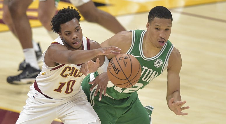 Oct 15, 2019; Cleveland, OH, USA; Boston Celtics forward Grant Williams (12) knocks the ball from Cleveland Cavaliers guard Darius Garland (10) in the third quarter at Rocket Mortgage FieldHouse. Mandatory Credit: David Richard-USA TODAY Sports Oct 15, 2019; Cleveland, OH, USA; Boston Celtics forward Grant Williams (12) knocks the ball from Cleveland Cavaliers guard Darius Garland (10) in the third quarter at Rocket Mortgage FieldHouse. Mandatory Credit: David Richard-USA TODAY Sports