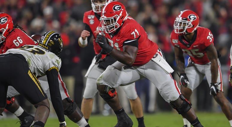 Georgia Bulldogs offensive lineman Andrew Thomas (71) blocks against the Missouri Tigers during the first half at Sanford Stadium. Georgia Bulldogs offensive lineman Andrew Thomas (71) blocks against the Missouri Tigers during the first half at Sanford Stadium.