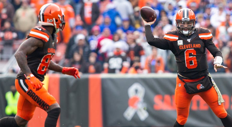 Nov 10, 2019; Cleveland, OH, USA; Cleveland Browns quarterback Baker Mayfield (6) throws the ball to wide receiver Jarvis Landry (80) during the first quarter against the Buffalo Bills at FirstEnergy Stadium. Cleveland Browns wide receiver Jarvis Landry (left) and quarterback Baker Mayfield (right)