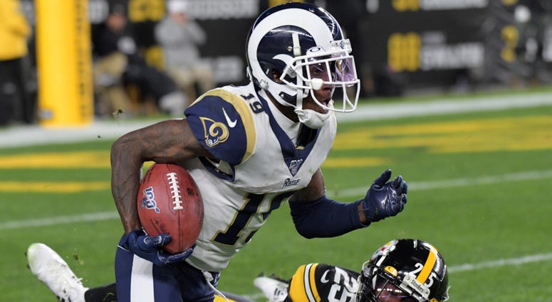 Los Angeles Rams wide receiver JoJo Natson (19) is pursued by Pittsburgh Steelers cornerback Artie Burns (25) on a punt return at Heinz Field. Returner JoJo Natson agreed to a contract with the Cleveland Browns