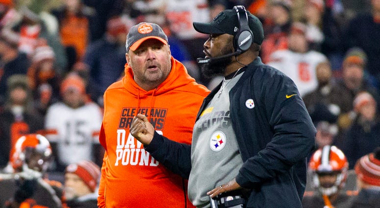 Cleveland Browns head coach Freddie Kitchens and Pittsburgh Steelers head coach Mike Tomlin talk as the officials discern the details of a fight that happened on the field in the final seconds of the fourth quarter at FirstEnergy Stadium.