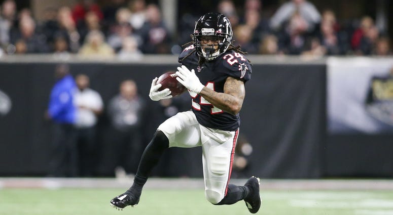 Nov 28, 2019; Atlanta, GA, USA; Atlanta Falcons running back Devonta Freeman (24) runs the ball against the New Orleans Saints in the first half at Mercedes-Benz Stadium. Mandatory Credit: Brett Davis-USA TODAY Sports Nov 28, 2019; Atlanta, GA, USA; Atlanta Falcons running back Devonta Freeman (24) runs the ball against the New Orleans Saints in the first half at Mercedes-Benz Stadium. Mandatory Credit: Brett Davis-USA TODAY Sports
