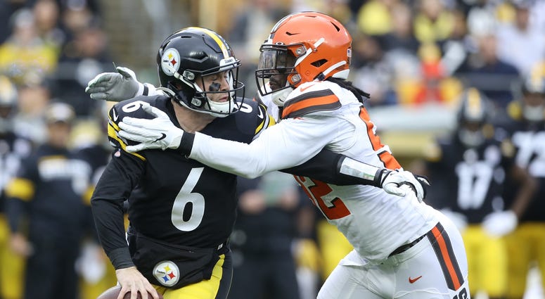 Dec 1, 2019; Pittsburgh, PA, USA; Pittsburgh Steelers quarterback Devlin Hodges (6) is sacked by Cleveland Browns defensive end Chad Thomas (92) during the first quarter at Heinz Field. Mandatory Credit: Charles LeClaire-USA TODAY Sports Dec 1, 2019; Pittsburgh, PA, USA; Pittsburgh Steelers quarterback Devlin Hodges (6) is sacked by Cleveland Browns defensive end Chad Thomas (92) during the first quarter at Heinz Field. Mandatory Credit: Charles LeClaire-USA TODAY Sports