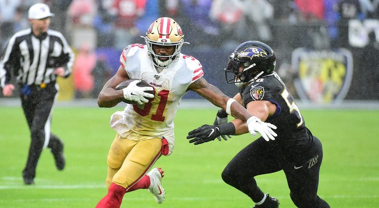 Dec 1, 2019; Baltimore, MD, USA; San Francisco 49ers running back Raheem Mostert (31) runs with the ball while being pursued by Baltimore Ravens linebacker L.J. Fort (58) in the second quarter at M&T Bank Stadium. Mandatory Credit: Evan Habeeb-USA TODAY S Dec 1, 2019; Baltimore, MD, USA; San Francisco 49ers running back Raheem Mostert (31) runs with the ball while being pursued by Baltimore Ravens linebacker L.J. Fort (58) in the second quarter at M&T Bank Stadium. Mandatory Credit: Evan Habeeb-USA TODAY S