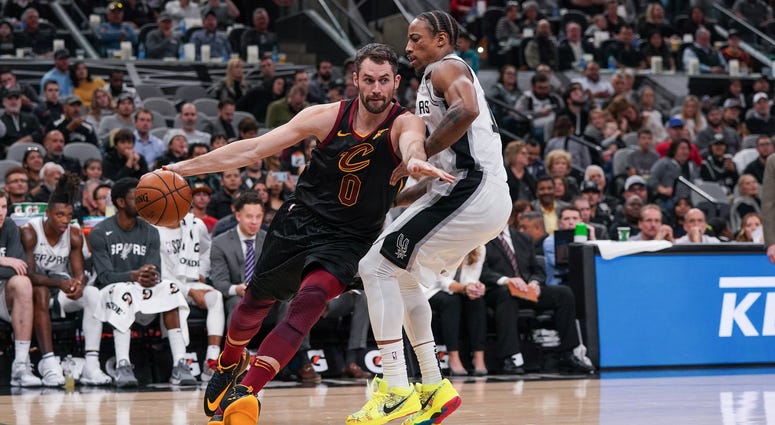 Dec 12, 2019; San Antonio, TX, USA; Cleveland Cavaliers forward Kevin Love (0) dribbles the ball around San Antonio Spurs guard DeMar DeRozan (10) in the first half at the AT&T Center. Mandatory Credit: Daniel Dunn-USA TODAY Sports Dec 12, 2019; San Antonio, TX, USA; Cleveland Cavaliers forward Kevin Love (0) dribbles the ball around San Antonio Spurs guard DeMar DeRozan (10) in the first half at the AT&T Center. Mandatory Credit: Daniel Dunn-USA TODAY Sports