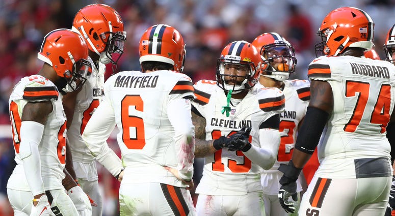 Cleveland Browns wide receiver Odell Beckham Jr. (13) in the huddle with quarterback Baker Mayfield (6) against the Arizona Cardinals at State Farm Stadium. Cleveland Browns wide receiver Odell Beckham Jr. (13) in the huddle with quarterback Baker Mayfield (6) against the Arizona Cardinals at State Farm Stadium.