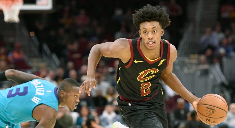 Dec 18, 2019; Cleveland, OH, USA; Cleveland Cavaliers guard Collin Sexton (2) drives against Charlotte Hornets guard Terry Rozier (3) in the fourth quarter at Rocket Mortgage FieldHouse. Cleveland Cavaliers guard Collin Sexton