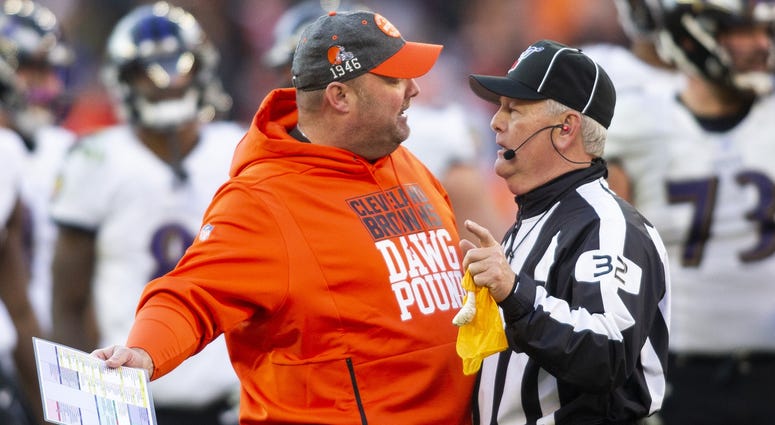 Cleveland Browns head coach Freddie Kitchens talks with head linesman Jeff Bergman (32) during the fourth quarter against the Baltimore Ravens at FirstEnergy Stadium. Cleveland Browns head coach Freddie Kitchens talks with head linesman Jeff Bergman (32) during the fourth quarter against the Baltimore Ravens at FirstEnergy Stadium.