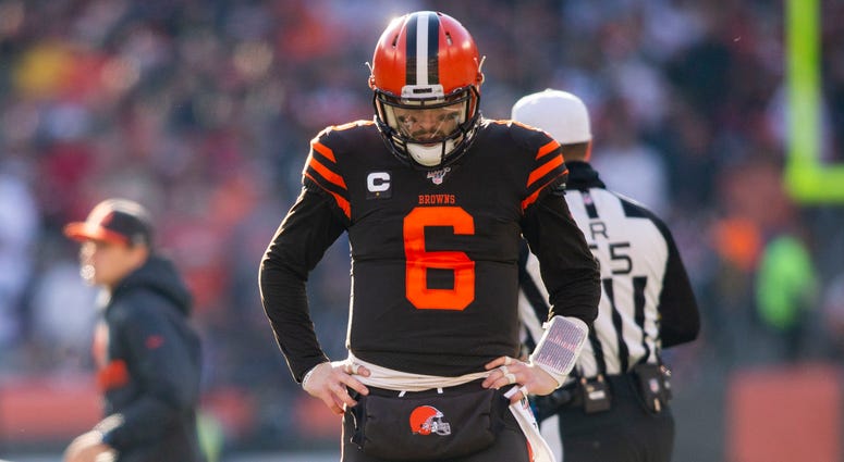 Cleveland Browns quarterback Baker Mayfield (6) walks away following an injury to running back Dontrell Hilliard (25) during the second quarter against the Baltimore Ravens at FirstEnergy Stadium. Baker Mayfield Cleveland Browns