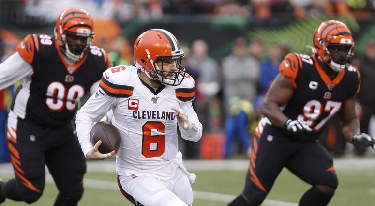 Baker Mayfield (6) runs with the ball against the Cincinnati Bengals during the first half at Paul Brown Stadium. Mandatory Credit: David Kohl-USA TODAY Sports Baker Mayfield (6) runs with the ball against the Cincinnati Bengals during the first half at Paul Brown Stadium. Mandatory Credit: David Kohl-USA TODAY Sports