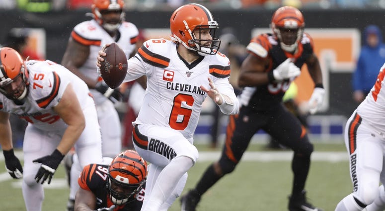 Baker Mayfield (6) runs with the ball against the Cincinnati Bengals during the first half at Paul Brown Stadium. Mandatory Credit: David Kohl-USA TODAY Sports Baker Mayfield (6) runs with the ball against the Cincinnati Bengals during the first half at Paul Brown Stadium. Mandatory Credit: David Kohl-USA TODAY Sports