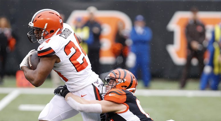 Dec 29, 2019; Cincinnati, Ohio, USA; Cleveland Browns running back Nick Chubb (24) runs with the ball as Cincinnati Bengals defensive end Sam Hubbard (94) defends during the first half at Paul Brown Stadium. Mandatory Credit: David Kohl-USA TODAY Sports Dec 29, 2019; Cincinnati, Ohio, USA; Cleveland Browns running back Nick Chubb (24) runs with the ball as Cincinnati Bengals defensive end Sam Hubbard (94) defends during the first half at Paul Brown Stadium. Mandatory Credit: David Kohl-USA TODAY Sports