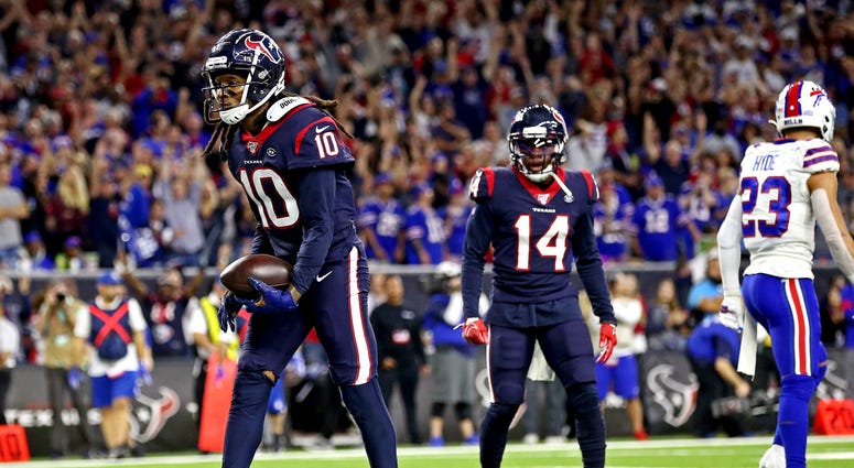 Jan 4, 2020; Houston, Texas, USA; Houston Texans wide receiver DeAndre Hopkins (10) celebrates after scoring a two point conversion during the fourth quarter against the Buffalo Bills in the AFC Wild Card NFL Playoff game at NRG Stadium. Mandatory Credit: Jan 4, 2020; Houston, Texas, USA; Houston Texans wide receiver DeAndre Hopkins (10) celebrates after scoring a two point conversion during the fourth quarter against the Buffalo Bills in the AFC Wild Card NFL Playoff game at NRG Stadium. Mandatory Credit: