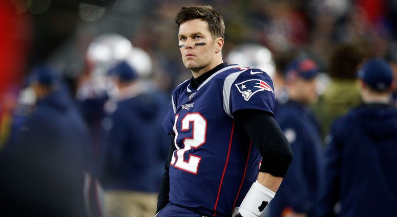 New England Patriots quarterback Tom Brady (12) watches an official review during the second quarter of a game against the Tennessee Titans at Gillette Stadium. New England Patriots quarterback Tom Brady (12) watches an official review during the second quarter of a game against the Tennessee Titans at Gillette Stadium.