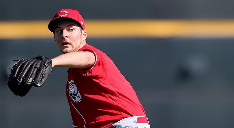 Cincinnati Reds starting pitcher Trevor Bauer (27) long tosses, Saturday, Feb. 15, 2020, at the Cincinnati Reds Spring Training Facility in Goodyear, Arizona. Cincinnati Reds starting pitcher Trevor Bauer (27) long tosses, Saturday, Feb. 15, 2020, at the Cincinnati Reds Spring Training Facility in Goodyear, Arizona.