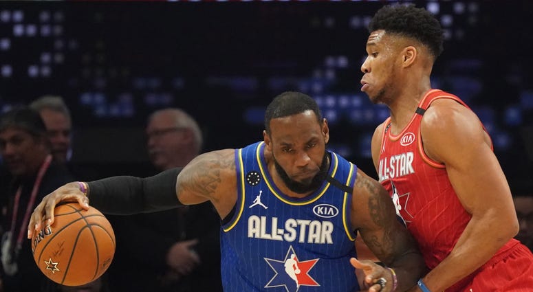 Feb 16, 2020; Chicago, Illinois, USA; Team LeBron forward LeBron James of the Los Angeles Lakers drives against Team Giannis forward Giannis Antetokounmpo of the Milwaukee Bucks during the third quarter of the 2020 NBA All Star Game at United Center. Los Angeles Lakers player LeBron James (left) and Milwaukee Bucks player Giannis Antetokounmpo