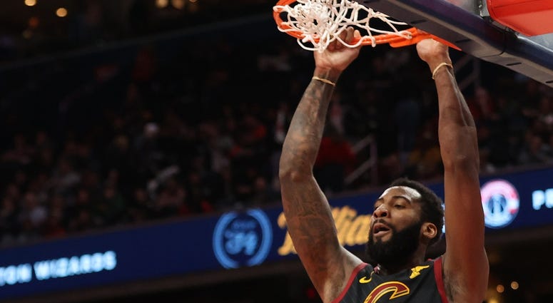 Cleveland Cavaliers center Andre Drummond (3) dunks the ball as Washington Wizards forward Moritz Wagner (21) looks on in the second quarter at Capital One Arena. Cleveland Cavaliers center Andre Drummond (3) dunks the ball as Washington Wizards forward Moritz Wagner (21) looks on in the second quarter at Capital One Arena.